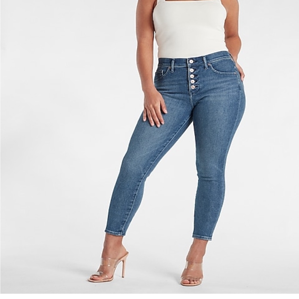 Express Mid rise Medium wash button fly skinny jeans. Brand new. Tags attached.
